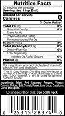 Marie Sharp's Belizean Heat sauce label close-up highlighting natural ingredients.
