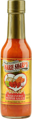 Marie Sharp's Fiery Hot Habanero sauce bottle pour shows bold heat for bold meals