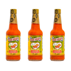 Marie Sharp’s Fiery Hot Habanero Sauce bottle adds bold Belizean heat to any dish.