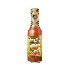 Marie Sharp's Fiery Hot sauce on grilled meats adds smoky heat
