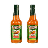 Marie Sharp's Mild Habanero Sauce bottle pour for a gentle kick.