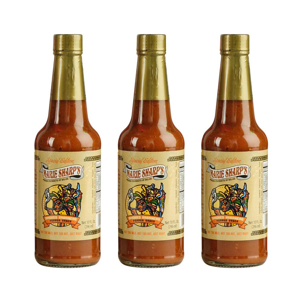 Marie Sharp's Smoked Habanero sauce bottle delivers smoky heat for grilled meats.