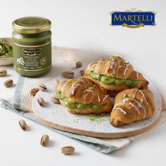 Martelli Pistachio Cream swirl on dessert crepe plate.