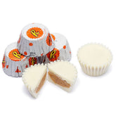 MASHBOX REEs Miniatures Peanut Butter Cups White bulk pack on a dessert table, ideal for events.