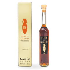 Matiz Flor de Garum bottle pour enhances umami in dressings and sauces.