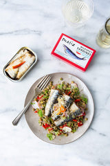 Matiz sardines on toast with olive oil and Piri Piri peppers.