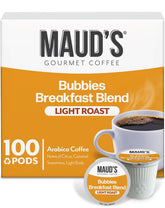Maud's Breakfast Blend pods beside a steaming cup for a bright morning brew