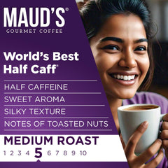 Maud's Half Caffeine Instant Coffee served over ice in a refreshing glass.
