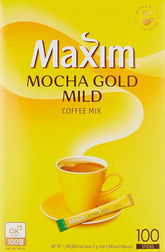 Maxim Mocha Gold Mild Coffee Mix tub closeup highlighting premium aroma for a comforting morning.