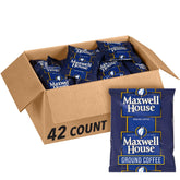 Maxwell House ground coffee packets closeup, showcasing aroma and convenience.