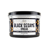 Mayde black sesame paste spread jar close-up highlighting nutty aroma.