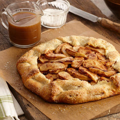 McCormick Apple Pie Spice being poured for a quick flavor boost on breakfast