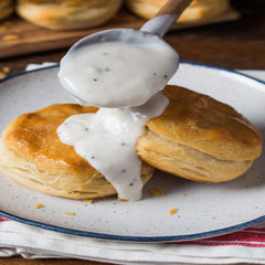 McCormick Country Gravy on eggs and biscuits for a quick breakfast.