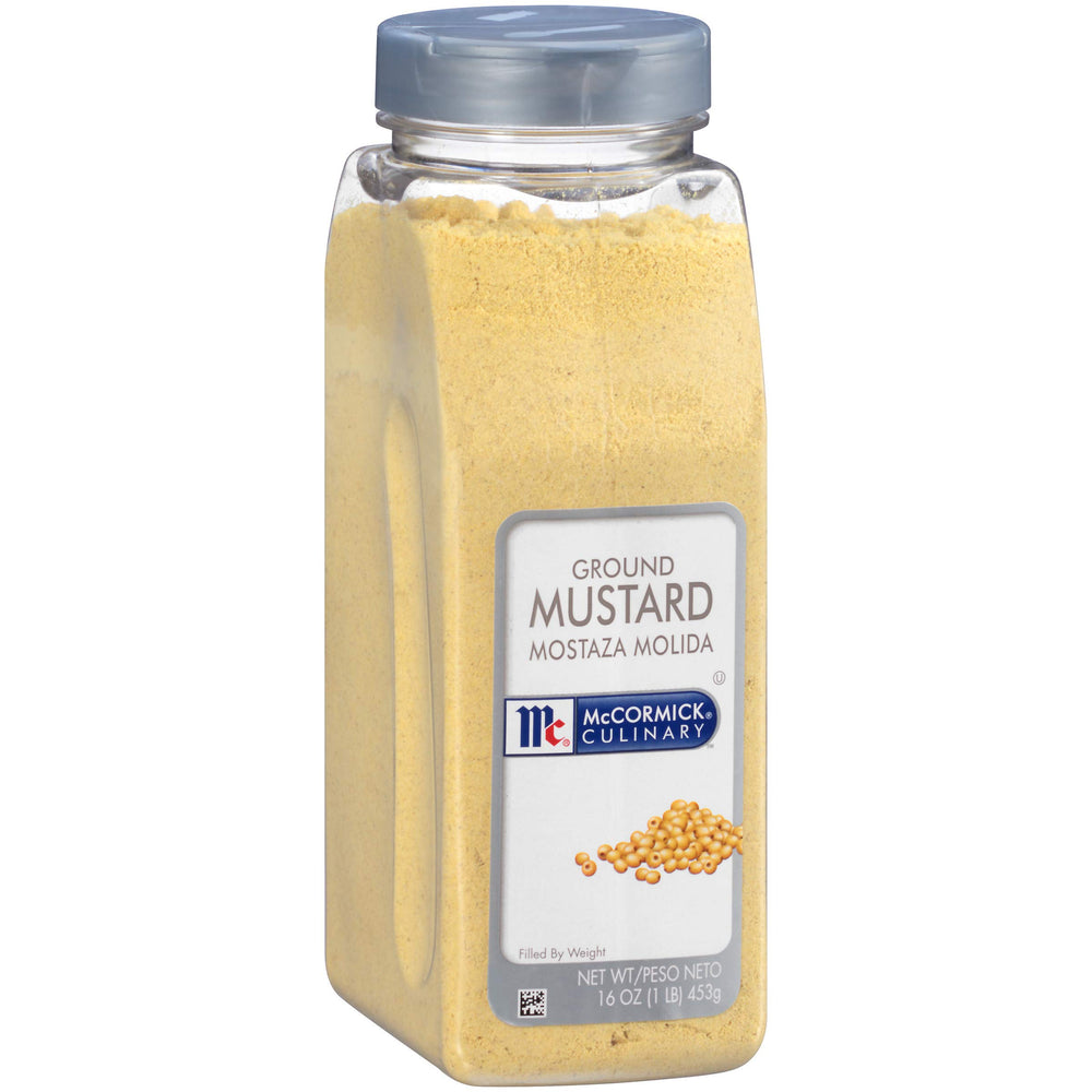 McCormick Culinary ground mustard powder close-up showing fine texture for even seasoning.