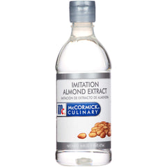 McCormick Culinary imitation almond extract bottle close-up for bakers and chefs.