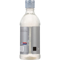 Pouring McCormick Culinary Peppermint Extract to create cool beverages.