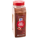 McCormick Dark Chili Powder bottle ready for seasoning, delivers rich color.