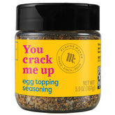 McCormick Egg Topping Seasoning bottle pouring for an easy flavor boost on eggs