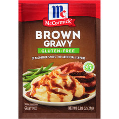 McCormick gluten-free brown gravy mix being whisked into water for quick gravy