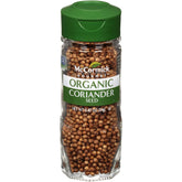 McCormick Gourmet Organic Coriander Seed bottle highlights warm, citrusy aroma for curries.