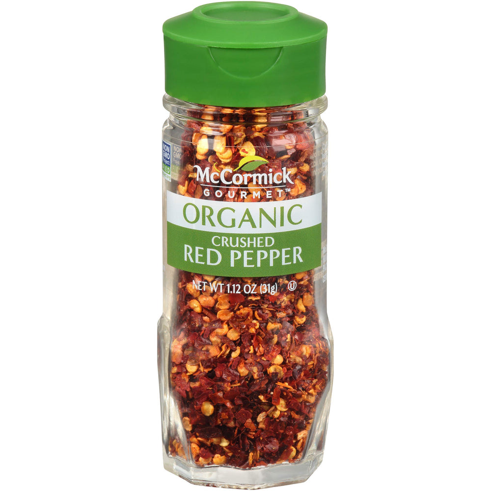 McCormick Gourmet Organic Crushed Red Pepper bottle adds vibrant heat to pasta.