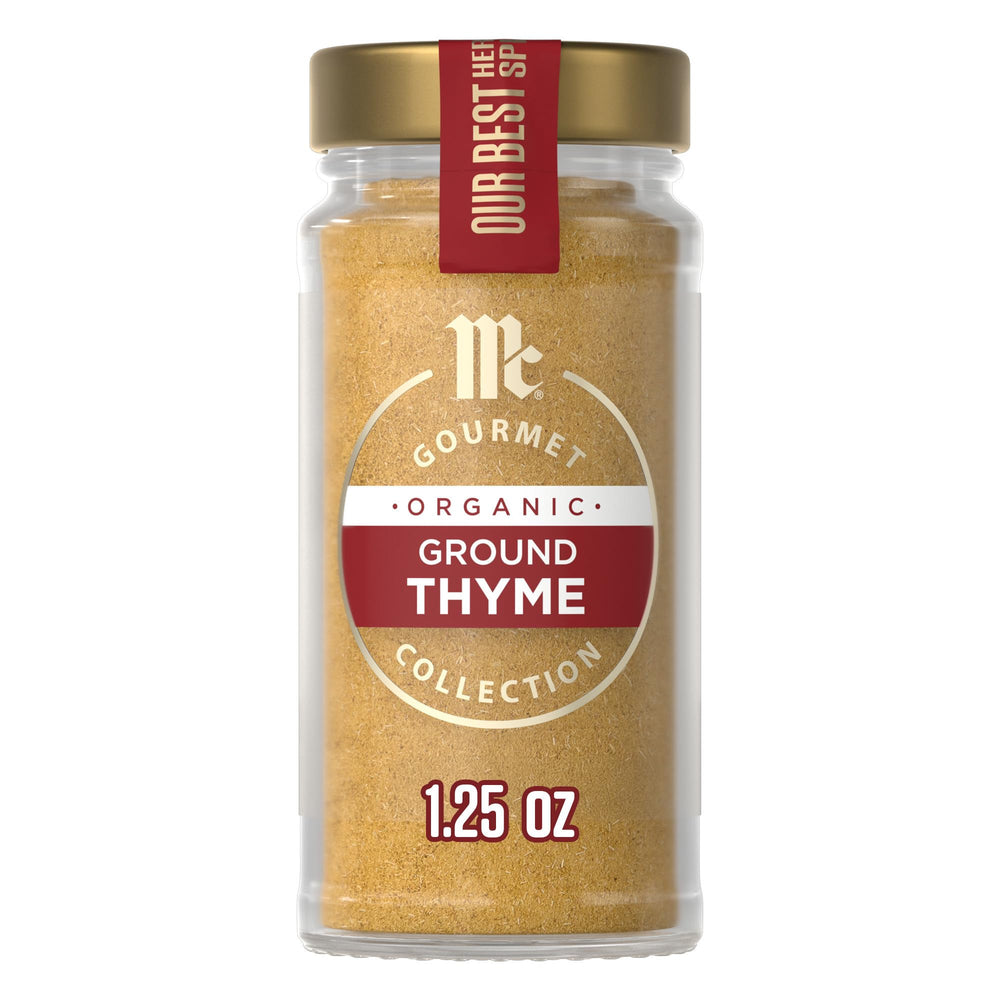 McCormick Gourmet Organic Ground Thyme bottle closeup highlighting its warm, aromatic flavor for savory dishes.