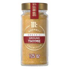 McCormick Gourmet Organic Ground Thyme bottle closeup highlighting its warm, aromatic flavor for savory dishes.