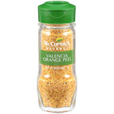 McCormick Gourmet Valencia Orange Peel bottle pour showing citrus zest ready to blend