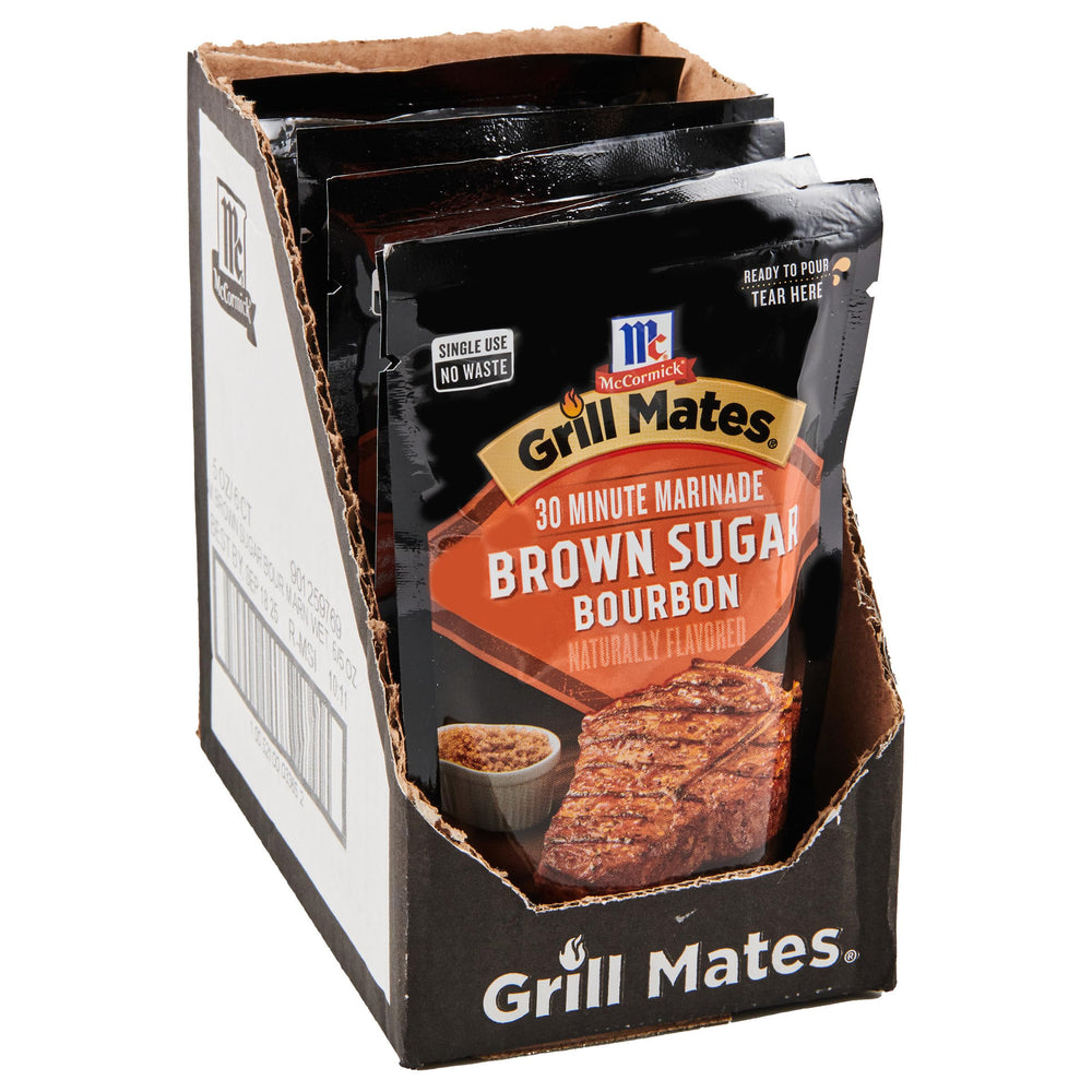 McCormick Grill Mates Brown Sugar Bourbon marinade being poured over chicken for flavorful grilling