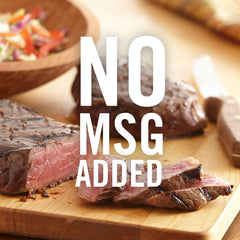 McCormick Spicy Montreal closeup of seared steak with smoky crust and aroma.