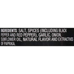 Shaker of McCormick Spicy Montreal seasoning ready for grill prep adds zesty kick