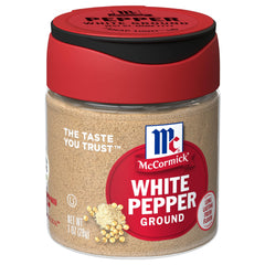 McCormick Ground White Pepper jar closeup shows premium seasoning for light dishes.
