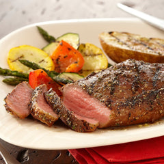 Tabletop scene with steak showing aroma impact from McCormick peppercorns