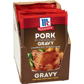 McCormick Pork Gravy Mix packaging on a pantry shelf for easy spice prep.