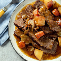 Raw chuck roast prepared for seasoning with McCormick mix for a flavorful weeknight.