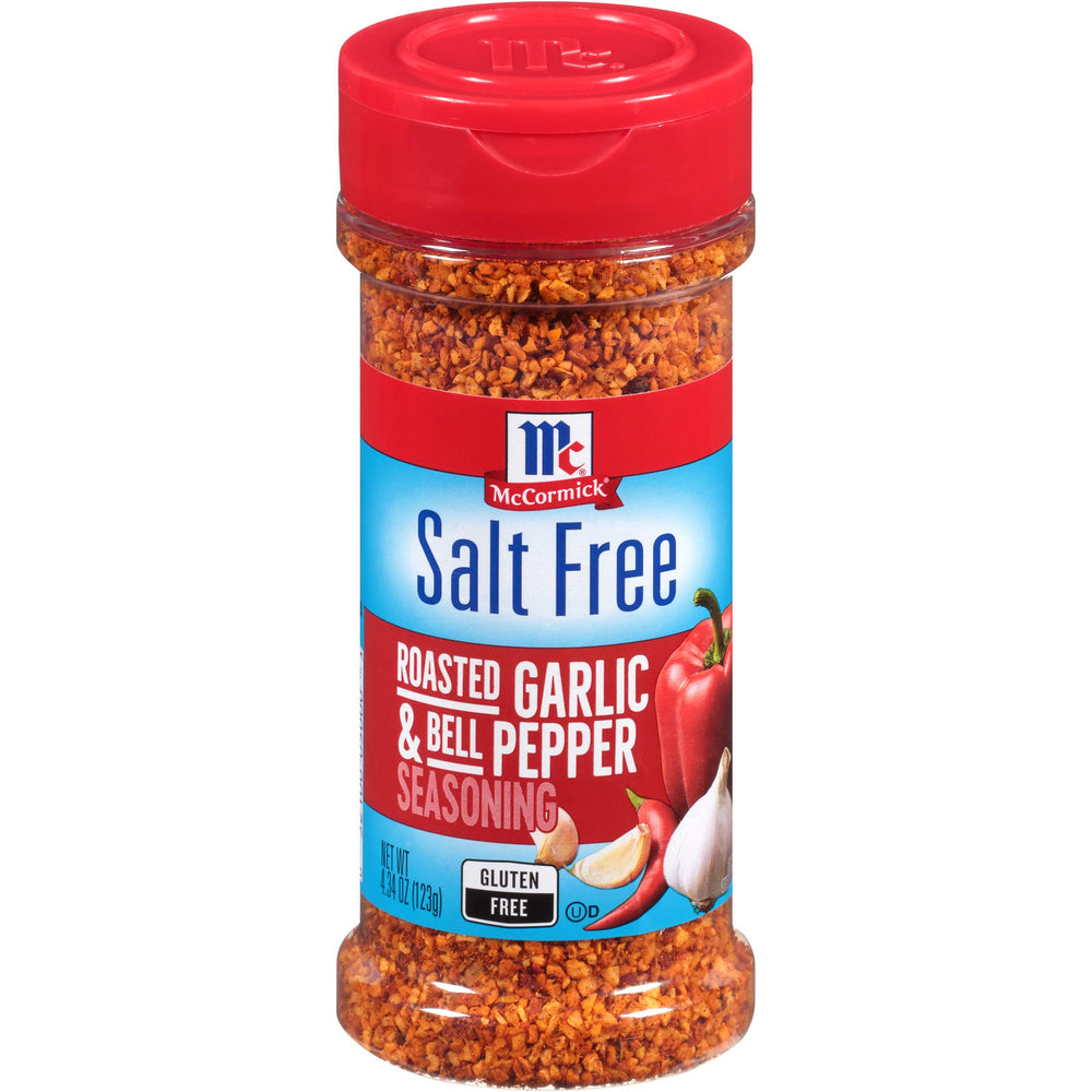 McCormick Salt Free Roasted Garlic & Bell Pepper Seasoning bottle on kitchen counter for easy flavoring.
