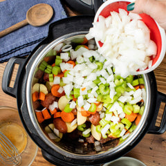McCormick spice blend dusting carrots and onions adds aroma and depth.