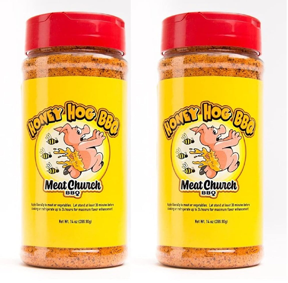 Meat Church Honey Hog rub bottles pouring to season pork and vegetables with sweet heat.