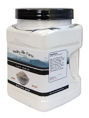 Pouring Medley Hills Farm corn starch into sauce to illustrate thickening.