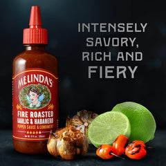 Melinda's Fire Roasted Garlic & Habanero bottle pour shows easy, versatile use.