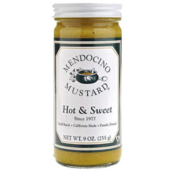 Mendocino Hot Sweet Mustard bottle enhances sandwiches with bold flavor.