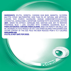 Curvy Mentos bottle on desk for on-the-go freshness.