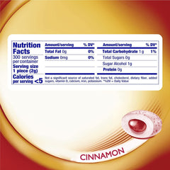 Close-up of Mentos gum piece reveals cinnamon flavor and sugar-free formula.