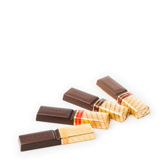 Merci Finest dark chocolates with elegant packaging enhances gifting.