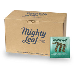 Mighty Leaf Spring Jasmine Green Tea foil-wrapped pouches preserve freshness for daily enjoyment.