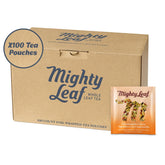 Mighty Leaf Chamomile Citrus tea pouch close-up with blooming herbs and soothing aroma.