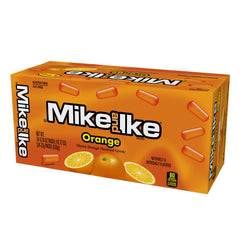 Mike and Ike Orange bite close-up emphasizing vibrant flavor and smooth chew.