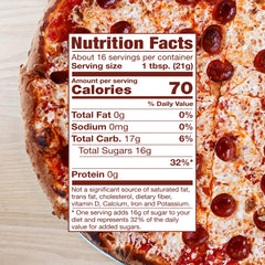 Mike's Hot Honey Extra Hot bottle pouring, bold heat for wings and snacks.