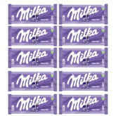 Milka Alpine Milk chocolate bar unwrapped, showcasing creamy alpine milk flavor.
