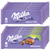 Milka Alpine Milk Chocolate bars on shelf, ideal for gifting and sharing.